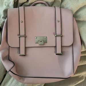 Pre owned pink backpack.